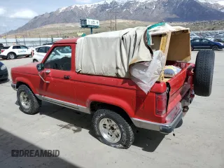 1990 Ford Bronco с VIN 1FMCU14T7LUA56022, выставлен на аукционе Copart как лот 52440415 с пробегом 57 215 миль миль и Чистый • Clean title. История ставок и продаж доступна на DreamBid. Изображение 2.