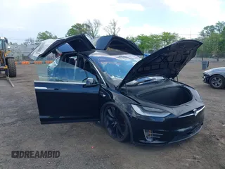 2019 Tesla Model X 75D with VIN 5YJXCBE21KF180203, listed as a IAAI auction lot 42190255 with 114,294 mi miles and . Bid and sale history available at carsss.com. Image 20.