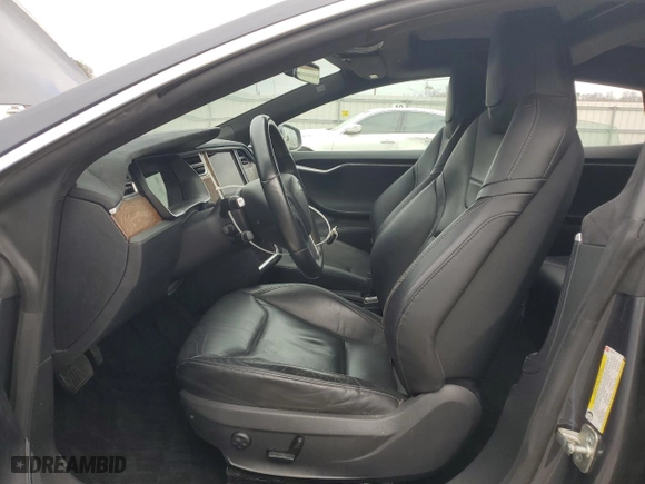 2016 Tesla Model S 90D with VIN 5YJSA1E20GF168108, listed as a Copart auction lot 42647935 with 138,295 mi miles and Salvage Title. Bid and sale history available at carsss.com. Image 7.