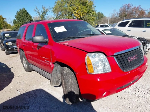 2014 GMC Yukon SLT with VIN 1GKS2CE09ER205031, listed as a IAAI auction lot 40513050 with 190,172 mi miles. Bid and sale history available at carsss.com. Image 1.