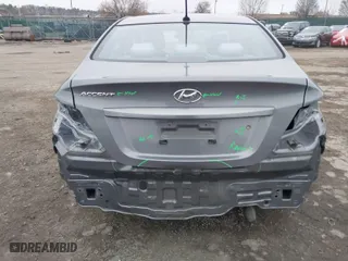 2014 Hyundai Accent GLS with VIN KMHCT4AE6EU777090, listed as a IAAI auction lot 41853744 with 35,754 mi miles. Bid and sale history available at carsss.com. Image 6.
