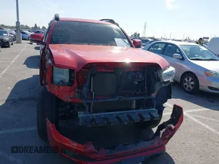 2018 Toyota Tacoma SR5 with VIN 3TMAZ5CN2JM067292, listed as a IAAI auction lot 41851959 with 70,988 mi miles and . Bid and sale history available at DreamBid. Image 12.