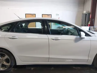 2016 Ford Fusion SE with VIN 3FA6P0HD0GR216525, listed as a IAAI auction lot 41977795 with 154,664 mi miles. Bid and sale history available at carsss.com. Image 14.