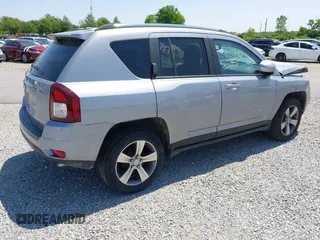 2017 Jeep Compass High Altitude with VIN 1C4NJCEB4HD200107, listed as a IAAI auction lot 42343513 with 96,580 mi miles and . Bid and sale history available at DreamBid. Image 4.