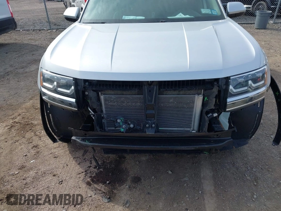 2018 Volkswagen Atlas SE with VIN 1V2KR2CA6JC560411, listed as a IAAI auction lot 41887472 with 168,155 mi miles and . Bid and sale history available at DreamBid. Image 6.