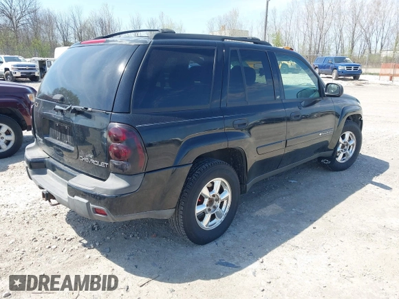 2003 Chevrolet TrailBlazer LTZ with VIN 1GNDT13S832352030, listed as a IAAI auction lot 42207699 with 240,986 mi miles and . Bid and sale history available at DreamBid. Image 4.