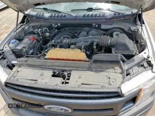 2019 Ford F-150 XL with VIN 1FTMF1CB8KKC24255, listed as a Copart auction lot 64755525 with 100,980 mi miles and Salvage title. Bid and sale history available at DreamBid. Image 11.