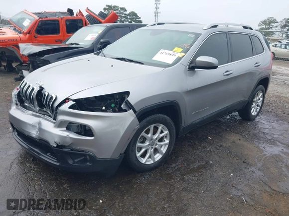 2016 Jeep Cherokee Latitude with VIN 1C4PJLCS7GW336973, listed as a IAAI auction lot 41769839 with 89,805 mi miles. Bid and sale history available at carsss.com. Image 2.