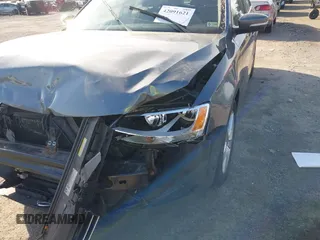 2013 Volkswagen Jetta TDI w/Premium z VIN 3VWLL7AJ6DM291317, wystawiony jako IAAI lot #42091621 z przebiegiem 169 448 mil mil oraz . Historia ofert i sprzedaży dostępna na DreamBid. Obrazek 6.