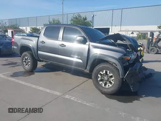 2016 Toyota Tacoma SR with VIN 3TMCZ5AN9GM037601, listed as a IAAI auction lot 42225238 with 184,059 mi miles and . Bid and sale history available at DreamBid. Image 1.