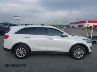 2017 Kia Sorento LX with VIN 5XYPG4A35HG205801, listed as a IAAI auction lot 42143064 with 129,647 mi miles. Bid and sale history available at carsss.com. Image 13.