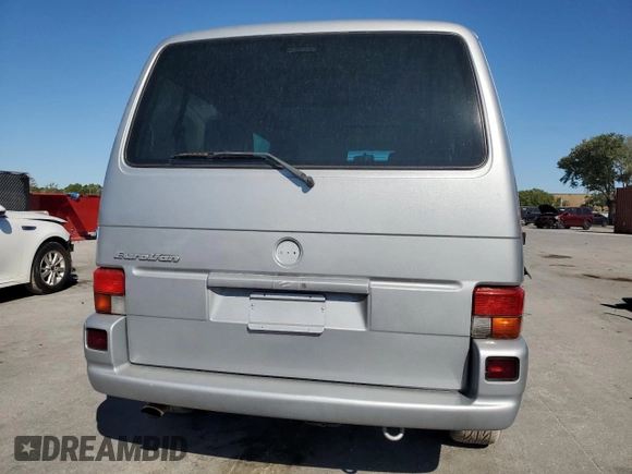 2002 Volkswagen EuroVan с VIN WV2KB47012H065431, выставлен на аукционе Copart как лот 49010445 с пробегом 78 985 миль миль и Чистый • Clean title. История ставок и продаж доступна на DreamBid. Изображение 6.