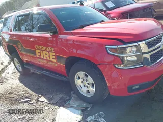 2019 Chevrolet Tahoe Commercial z VIN 1GNSKFEC7KR388178, wystawiony jako IAAI lot #41299288 z przebiegiem 82 851 mil mil oraz . Historia ofert i sprzedaży dostępna na DreamBid. Obrazek 1.