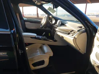 2017 BMW X5 xDrive40e iPerformance with VIN 5UXKT0C35H0V97078, listed as a IAAI auction lot 41601844 with 85,597 mi miles. Bid and sale history available at carsss.com. Image 5.