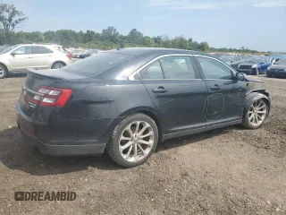2013 Ford Taurus Limited with VIN 1FAHP2J87DG181051, listed as a Copart auction lot 70630404 with 157,323 mi miles and Salvage title. Bid and sale history available at DreamBid. Image 3.