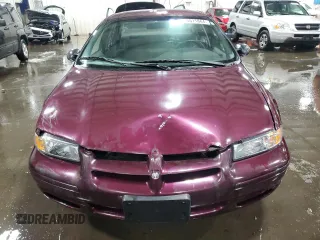 1999 Dodge Stratus z VIN 1B3EJ46X4XN676917, wystawiony jako Copart lot #85511864 z przebiegiem 135 783 mil mil oraz Szkoda całkowita • Salvage title. Historia ofert i sprzedaży dostępna na DreamBid. Obrazek 5.