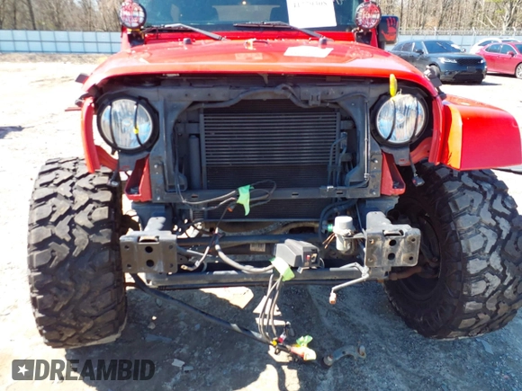 2015 Jeep Wrangler Unlimited Sahara with VIN 1C4BJWEG1FL748732, listed as a IAAI auction lot 41779308 with 109,986 mi miles. Bid and sale history available at carsss.com. Image 6.