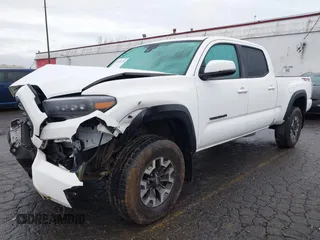 2021 Toyota Tacoma SR5 with VIN 3TMDZ5BN1MM100575, listed as a IAAI auction lot 41516274 with 61,974 mi miles and . Bid and sale history available at DreamBid. Image 18.