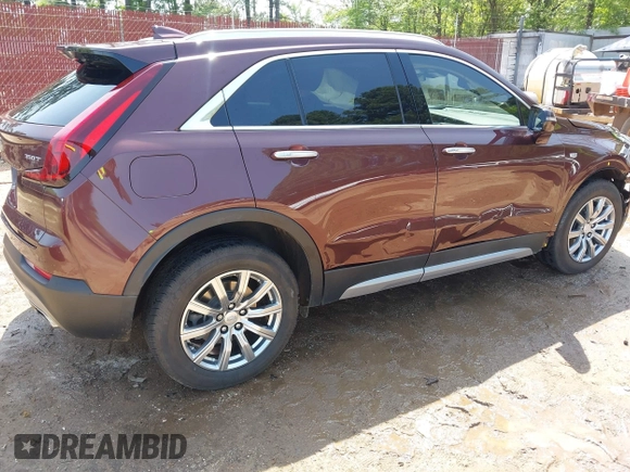 2023 Cadillac XT4 AWD Premium Luxury with VIN 1GYFZDR46PF125499, listed as a IAAI auction lot 41919403 with 44,647 mi miles and . Bid and sale history available at carsss.com. Image 4.