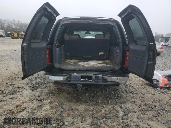 2002 Chevrolet Suburban LS with VIN 3GNEC16Z42G343960, listed as a Copart auction lot 88970245 with 284,632 mi miles and Salvage Title. Bid and sale history available at carsss.com. Image 6.