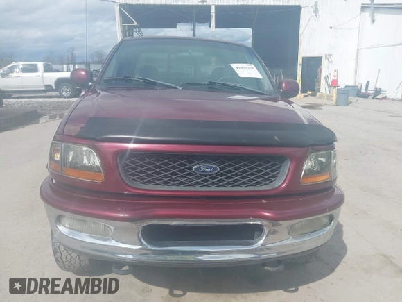 1998 Ford F-150 with VIN 1FTZX18W5WNC39962, listed as a IAAI auction lot 41951328 with 228,438 mi miles and . Bid and sale history available at DreamBid. Image 12.