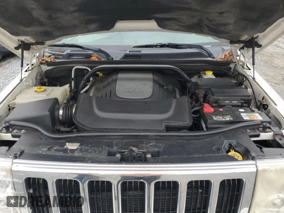 2010 Jeep Commander Limited z VIN 1J4RG5GT4AC153264, wystawiony jako Copart lot #77358474 z przebiegiem 170 634 mil mil oraz Szkoda całkowita • Salvage title. Historia ofert i sprzedaży dostępna na DreamBid. Obrazek 12.