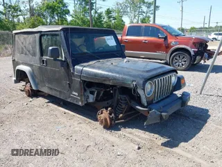 2005 Jeep Wrangler Unlimited with VIN 1J4FA44S25P385421, listed as a IAAI auction lot 42039381 with 1 mi miles. Bid and sale history available at carsss.com. Image 1.