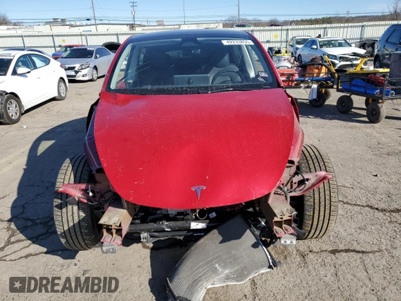 2023 Tesla Model Y Performance with VIN 7SAYGDEFXPF790747, listed as a Copart auction lot 42233855 with 25,452 mi miles and Salvage Title. Bid and sale history available at DreamBid. Image 5.
