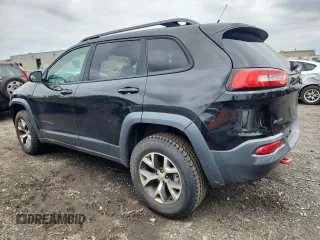 2014 Jeep Cherokee Trailhawk with VIN 1C4PJMBS3EW127928, listed as a Copart auction lot 63825865 with 172,712 mi miles and Salvage title. Bid and sale history available at DreamBid. Image 2.