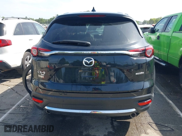 2021 Mazda CX-9 Carbon Edition with VIN JM3TCBDY3M0524241, listed as a IAAI auction lot 42538127 with 50,533 mi miles and . Bid and sale history available at DreamBid. Image 16.