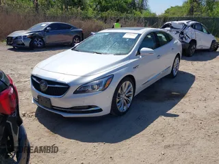 2017 Buick LaCrosse Premium with VIN 1G4ZR5SS4HU176557, listed as a IAAI auction lot 42106327 with 134,859 mi miles. Bid and sale history available at carsss.com. Image 2.