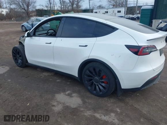 2021 Tesla Model Y Performance with VIN 5YJYGDEF1MF262930, listed as a IAAI auction lot 41606321 with 28,882 mi miles and . Bid and sale history available at DreamBid. Image 3.