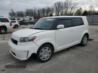2010 Scion xB with VIN JTLZE4FE5A1105779, listed as a Copart auction lot 87167404 with 255,623 mi miles and Salvage Title. Bid and sale history available at DreamBid. Image 1.