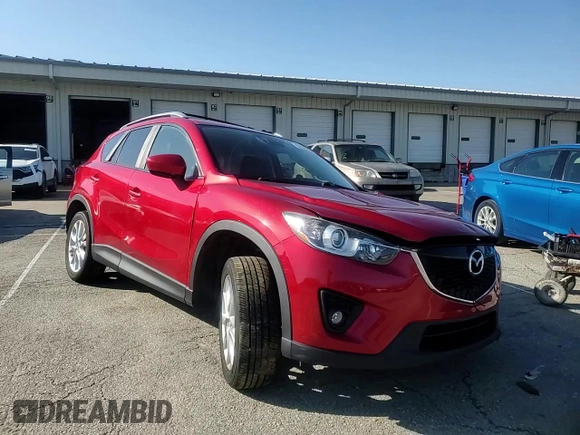 2014 Mazda CX-5 Grand Touring with VIN JM3KE4DY9E0419111, listed as a Copart auction lot 52250315 with 130,003 mi miles and Salvage Title. Bid and sale history available at DreamBid. Image 12.