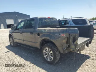 2018 Ford F-150 XL with VIN 1FTEW1EPXJKE71093, listed as a Copart auction lot 63812265 with 122,361 mi miles and Salvage title. Bid and sale history available at DreamBid. Image 2.