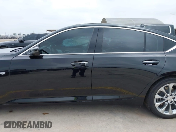 2023 Cadillac CT5 Premium Luxury z VIN 1G6DN5RK7P0119990, wystawiony jako IAAI lot #42293014 z przebiegiem 44 690 mil mil oraz . Historia ofert i sprzedaży dostępna na DreamBid. Obrazek 15.