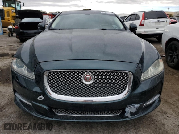 2015 Jaguar XJ with VIN SAJWA2GZ0F8V86007, listed as a Copart auction lot 82233514 with Not Provided miles and Clean Title. Bid and sale history available at carsss.com. Image 5.