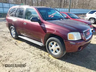 2007 GMC Envoy SLE with VIN 1GKDS13S472201367, listed as a IAAI auction lot 41327646 with 232,019 mi miles. Bid and sale history available at carsss.com. Image 1.