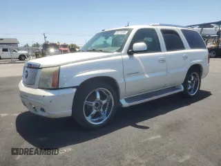 2005 Cadillac Escalade z VIN 1GYEC63T25R181430, wystawiony jako Copart lot #60573205 z przebiegiem 226 012 mil mil oraz Czysty tytuł • Clean title. Historia ofert i sprzedaży dostępna na DreamBid. Obrazek 1.