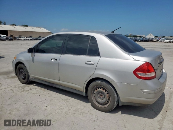 2009 Nissan Versa S with VIN 3N1BC11E39L376873, listed as a Copart auction lot 60299465 with 134,769 mi miles and Salvage title. Bid and sale history available at DreamBid. Image 2.