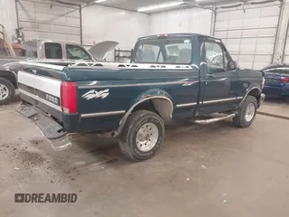 1994 Ford F-150 with VIN 1FTEF14N3RLB18233, listed as a IAAI auction lot 42193773 with 211,804 mi miles and . Bid and sale history available at DreamBid. Image 4.