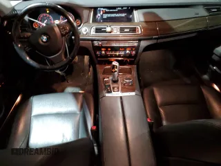 2015 BMW 7 Series 740Li xDrive with VIN WBAYF4C55FG291706, listed as a Copart auction lot 41992355 with 76,483 mi miles and Salvage Title. Bid and sale history available at carsss.com. Image 8.
