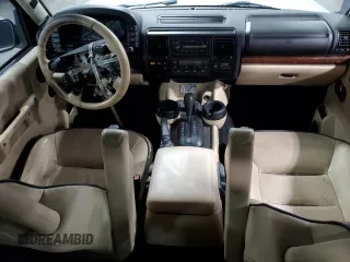 2003 Land Rover Discovery with VIN SALTY16493A801832, listed as a Copart auction lot 58690064 with 125,569 mi miles and Salvage Title. Bid and sale history available at DreamBid. Image 8.
