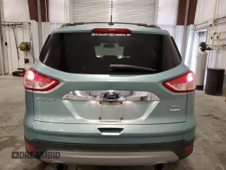2013 Ford Escape SEL with VIN 1FMCU9H93DUA72099, listed as a Copart auction lot 58691955 with 30,449 mi miles and Salvage title. Bid and sale history available at DreamBid. Image 6.