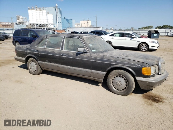 1988 Mercedes-Benz 560 with VIN WDBCA39D0JA401107, listed as a Copart auction lot 70535804 with 328,561 mi miles and Clean Title. Bid and sale history available at DreamBid. Image 4.