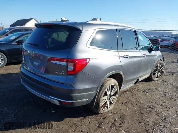 2021 Honda Pilot Elite with VIN 5FNYF6H09MB032350, listed as a IAAI auction lot 41514472 with 45,008 mi miles. Bid and sale history available at carsss.com. Image 4.