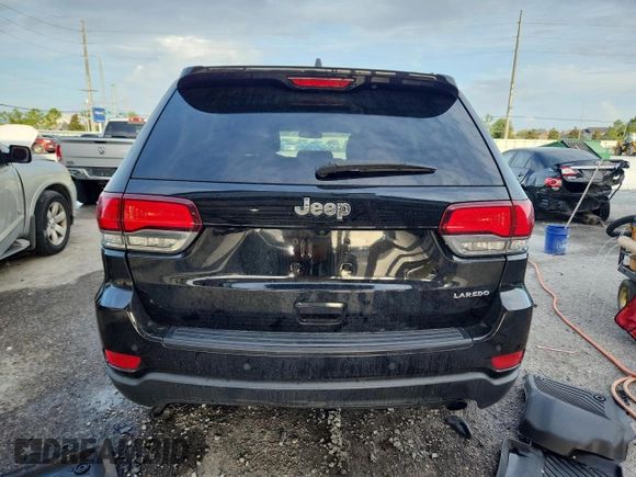 2020 Jeep Grand Cherokee Laredo E with VIN 1C4RJEAG7LC113542, listed as a Copart auction lot 62715585 with 64,124 mi miles and Salvage title. Bid and sale history available at DreamBid. Image 6.