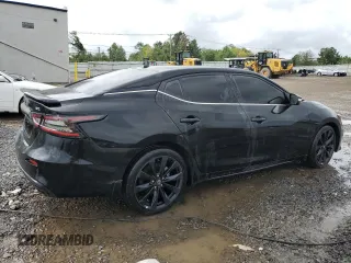 2023 Nissan Maxima SR with VIN 1N4AA6EV8PC506487, listed as a Copart auction lot 66585654 with 770 mi miles and Salvage title. Bid and sale history available at DreamBid. Image 3.