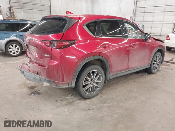 2018 Mazda CX-5 Grand Touring with VIN JM3KFBDM5J0414013, listed as a IAAI auction lot 42013479 with 88,225 mi miles and . Bid and sale history available at DreamBid. Image 4.
