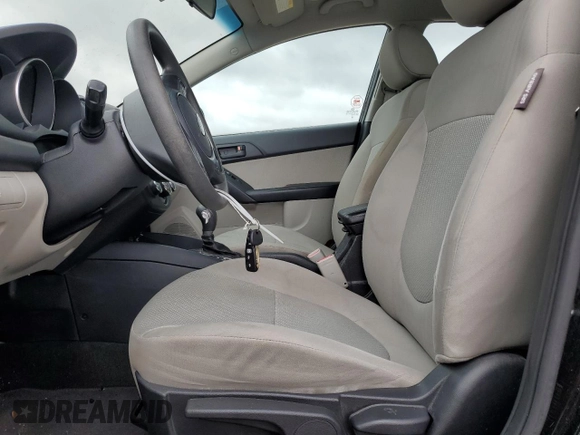 2012 Kia Forte EX with VIN KNAFU4A29C5597563, listed as a Copart auction lot 69807704 with 98,267 mi miles and Salvage Title. Bid and sale history available at carsss.com. Image 7.